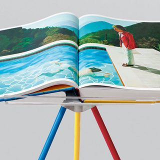 Hockney_A-Bigger-Book_Taschen_book-open-on-Marc-Newson-stand